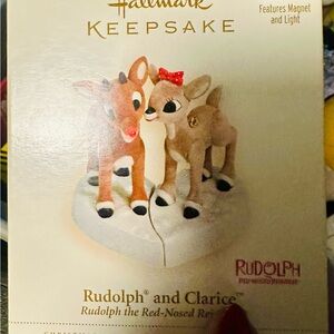 Never opened 2006 Hallmark Keepsake Rudolph and Clarice Magic light Ornament